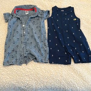 Two short sleeve rompers with anchors. 9M. Carter’s